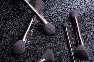 a makeup brush set on a table