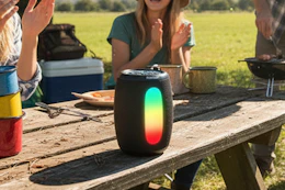 portable bluetooth speaker on picnic table