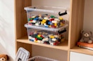 clear containers full of building block on a shelf