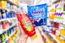 hand holding gain and finish dishwashing products