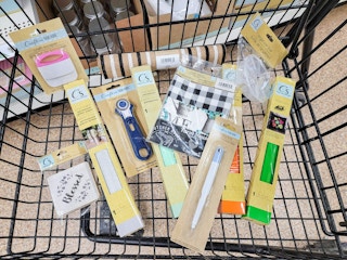 craft supplies in a cart