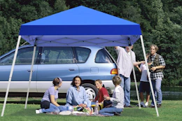 a family near a canopy tent