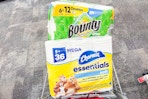 charmin toilet paper and bounty paper towels in a cart