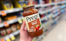 hand holding prego pasta sauce