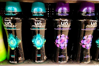 Bottles of Downy Unstopables on a store shelf