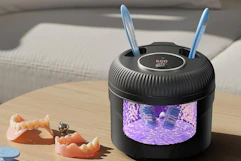 toothbrushes in a cleaner