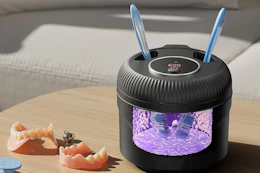 toothbrushes in a cleaner