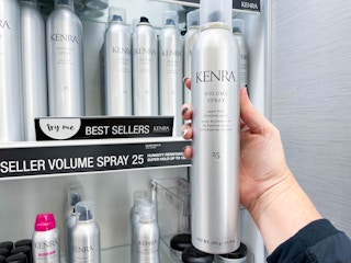 kenra styling spray being held