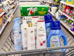 dove shampoo and body wash snuggle softener febreze air freshener and 7up soda pack in walgreens cart