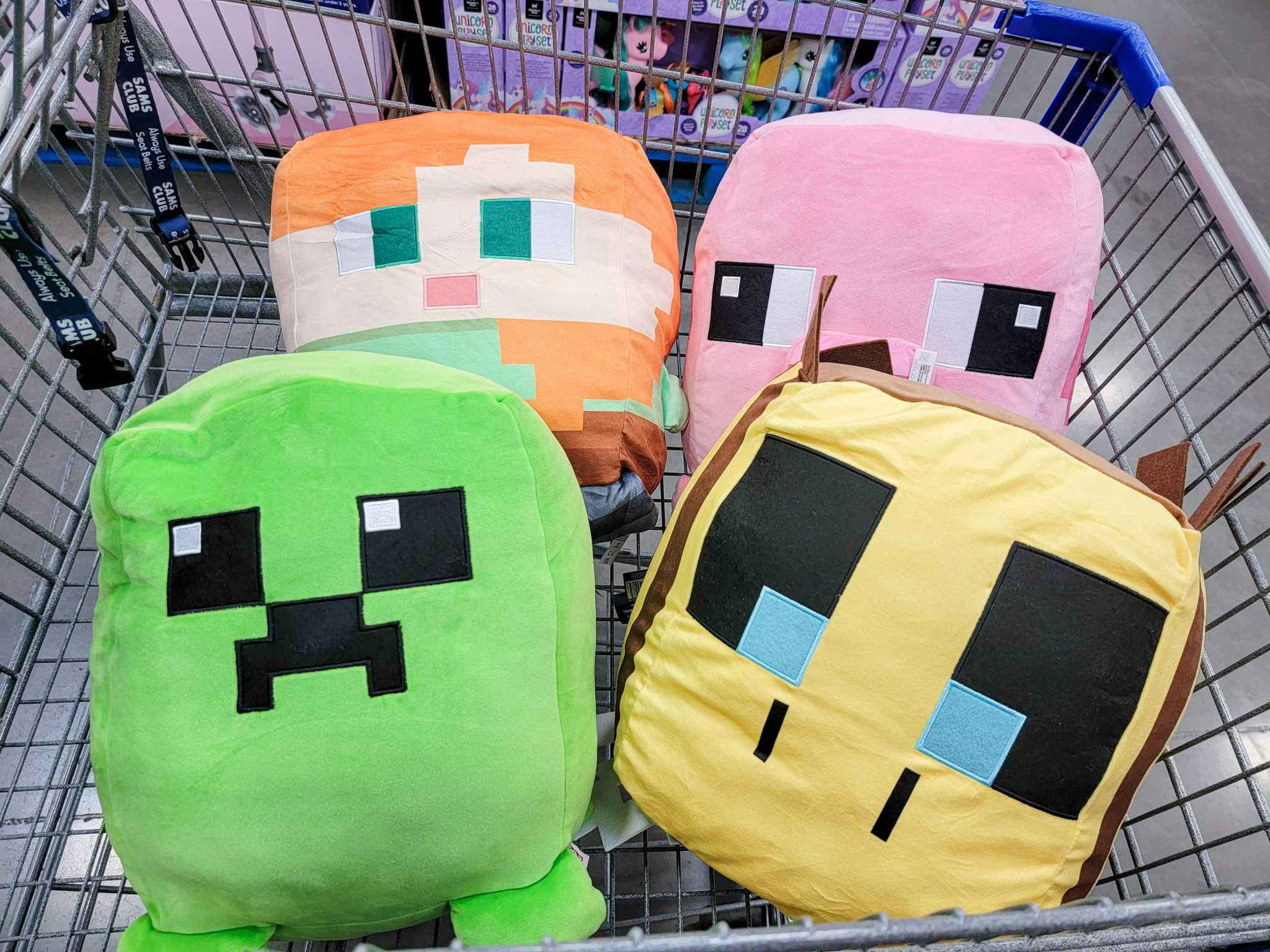 jumbo minecraft plushes in a cart