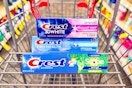 3 tubes of crest toothpaste in a cart