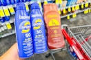 hand holding coppertone sunscreens