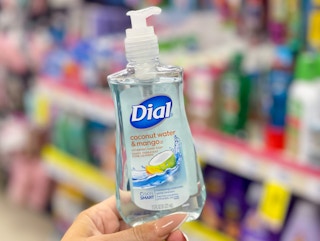 dial hand soap held in hand