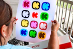 person holding photo poster with krazy coupon lady logos