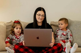Mom and children sitting on a couch