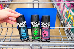 3 axe body sprays in a cart
