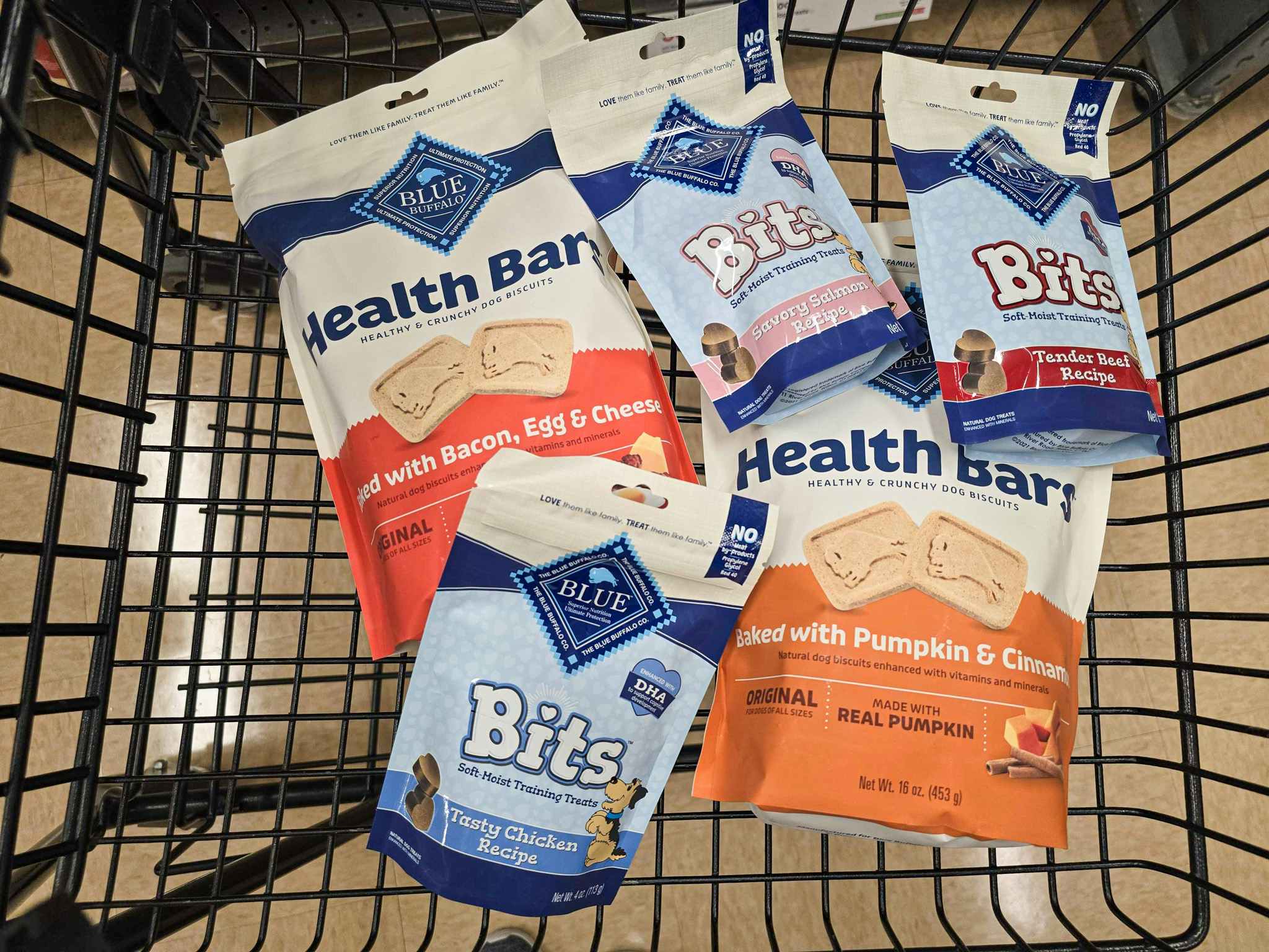 5 bags of blue buffalo dog treats in a cart