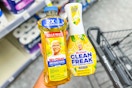 person holding mr clean products