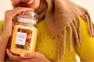 woman holding candle