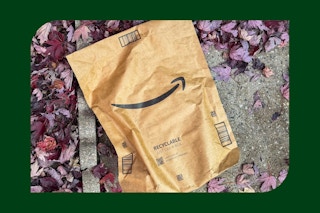 an amazon box being held