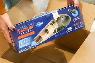 Corded car vacuum being removed from box