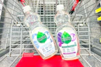 2 bottles of seventh generation dish soap in a cart
