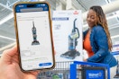 someone looking up the price of a product on the walmart app while their friend is putting the product in a cart
