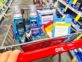 cvs shopping cart with crest, degree, neutrogena, and burts bees products
