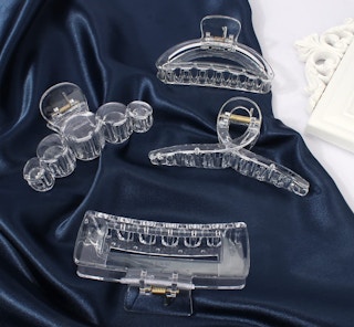 clear hair claw clips on navy fabric