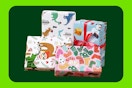 Four gifts are wrapped in cute paper: sloths, snowmen, socks, and dinosaurs.