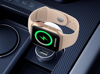 an Apple watch sitting on a charger