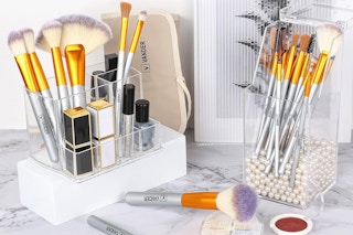 a makeup brush set on a counter