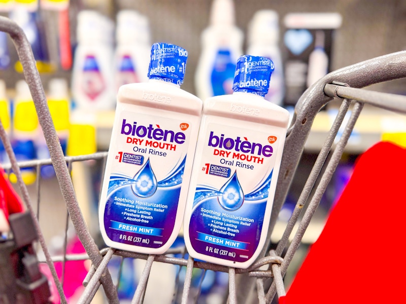 2 bottles of biotene mouthwash in a cart