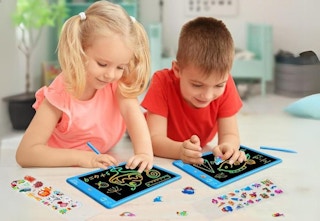 two children writing on their own LCD writing tablets