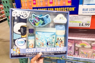 costco bluey or hello kitty bath set handheld near signage