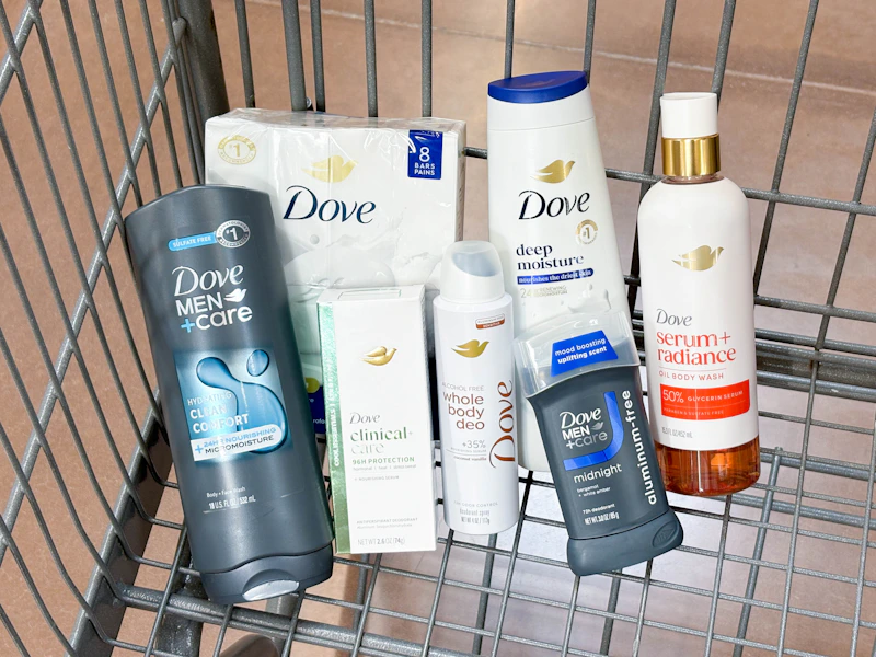 7 dove personal care products sitting in a walmart cart