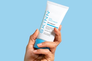someone holding a Skinn Cosmetics microderm treatment