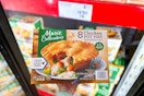 hand holding a pack of marie callenders pot pies