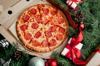 pizza in a box around christmas decor