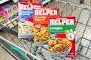 boxes of hamburger helper in shopping cart