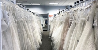 wedding dresses inside of a davids bridal store