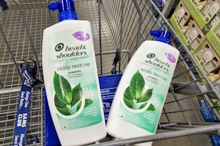 2 bottles of head & shoulders shampoo in a cart