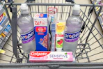 walgreens propel, storage bags, burt's bees, colgate products in shopping cart