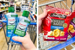 hand holding two bottles of cascade rinse aid and a hand holding a bag of Sargento crackers