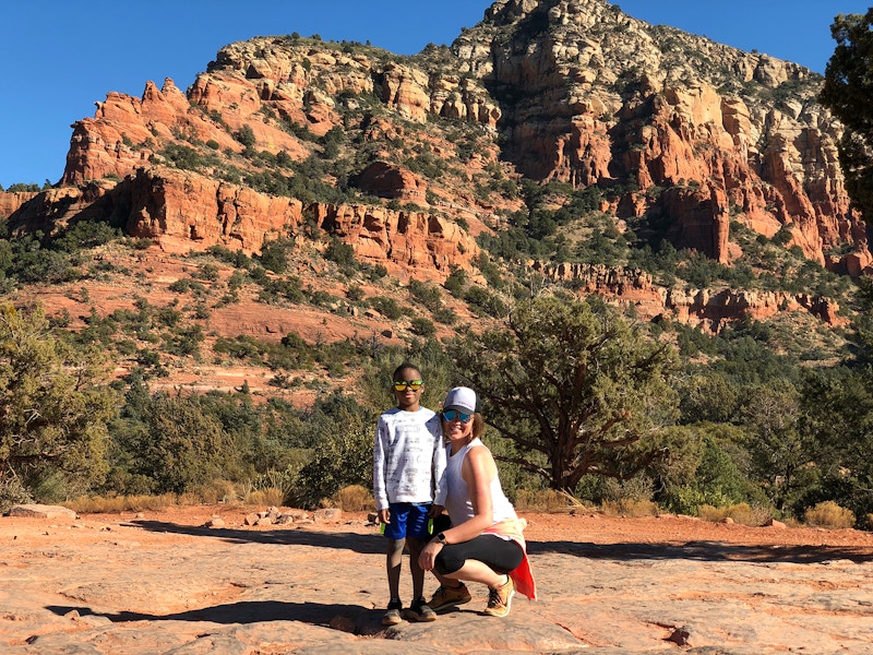 A woman and her son in a national park.