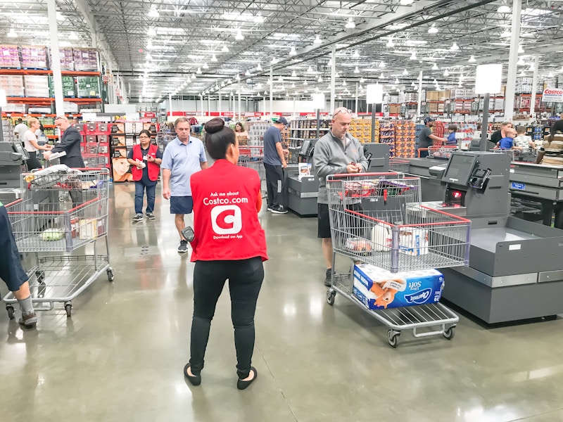 Self Checkoutline inside of a Costco Warehouse