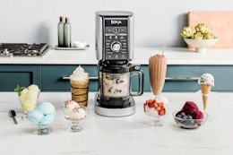 Ninja CREAMi Deluxe Ice Cream & Frozen Treat Maker, Includes (4) Family-Sized 24 oz. Tubs, 11-in-1, XL