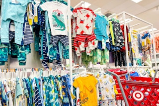 children's pajama sets sitting on racks at target