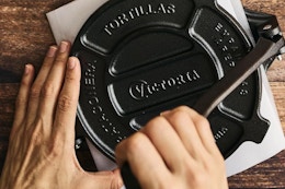 tortilla press being used