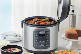 aroma professional rice cooker on a table